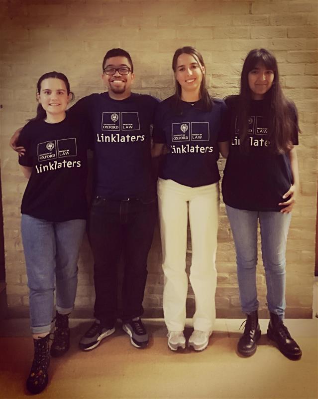 4 students smiling wearing Linklater t-shirts at Open Day